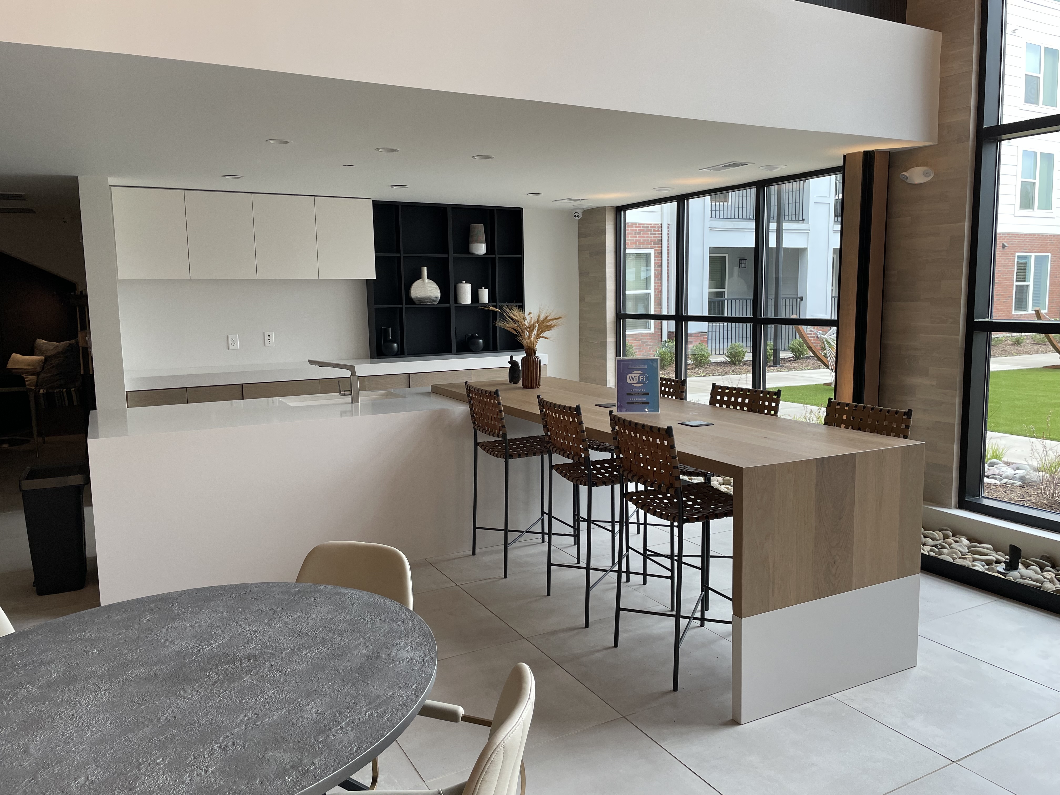 Legacy Heritage — modern community kitchen and bar area