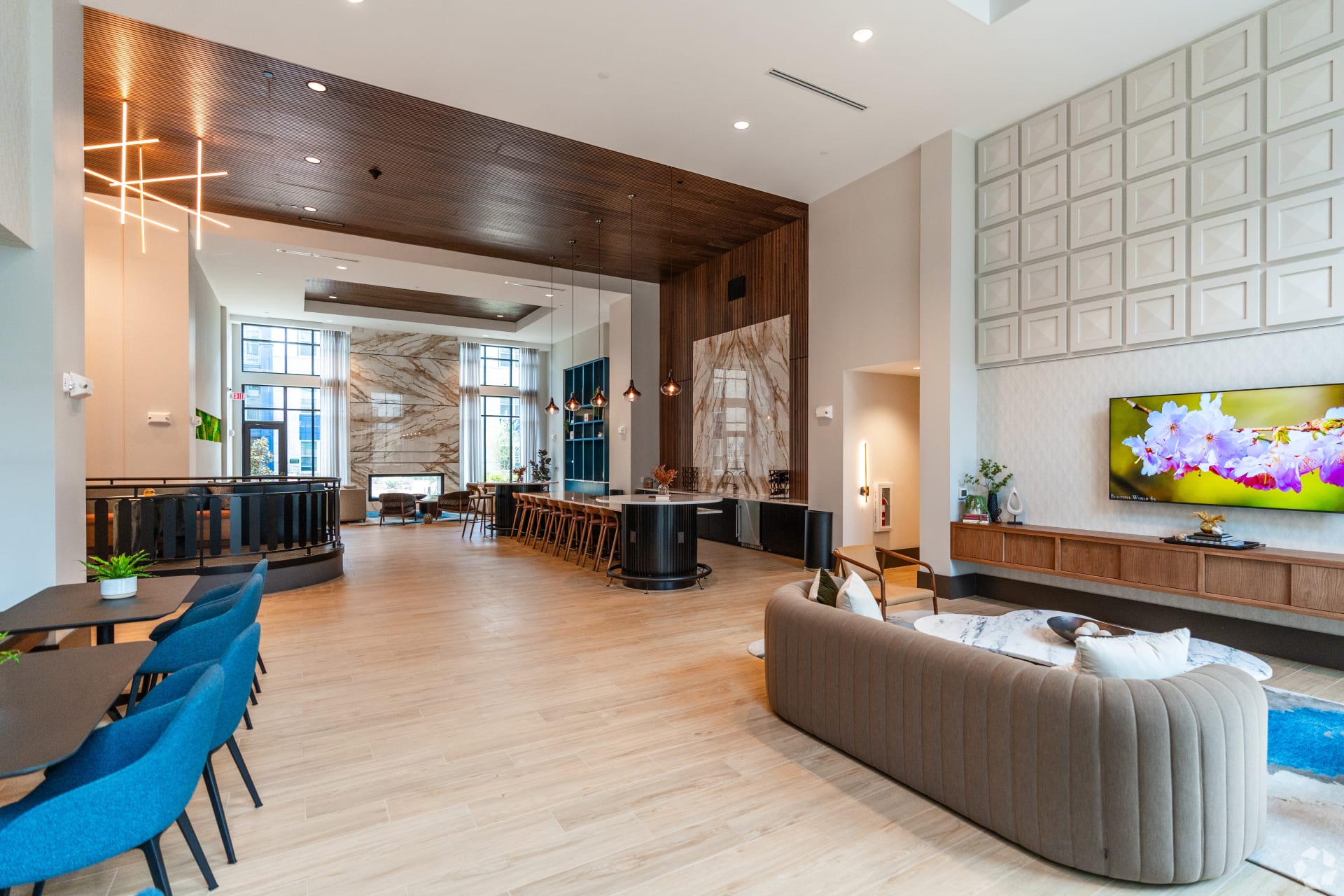 Preston Ridge — clubhouse millwork with dark wood ceiling and marble accents