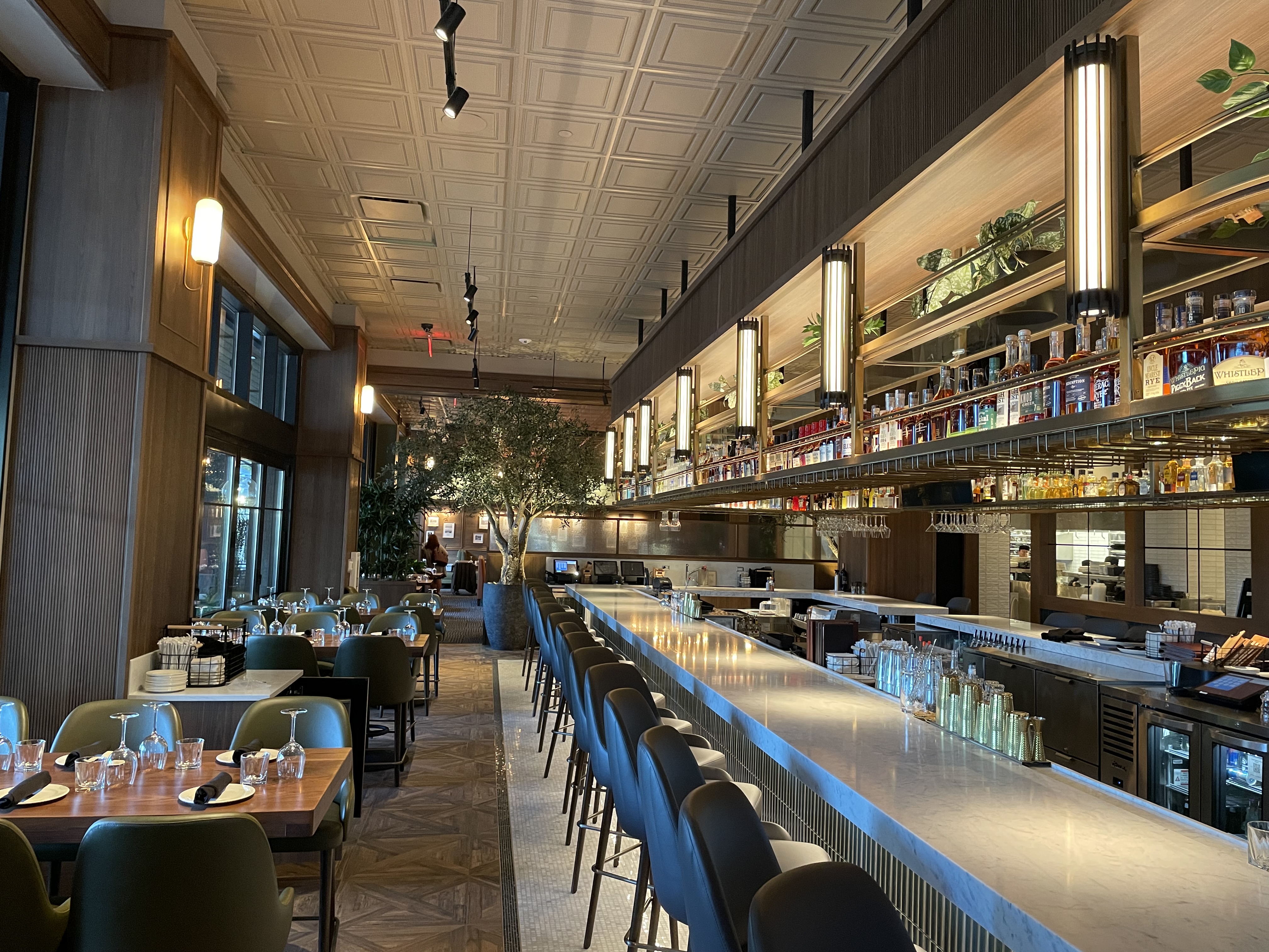 Village Tavern — custom bar millwork and wood paneling by MDN Cabinets